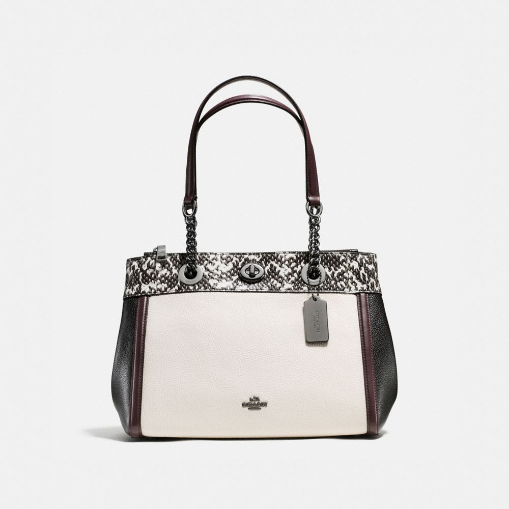 coach turnlock edie carryall