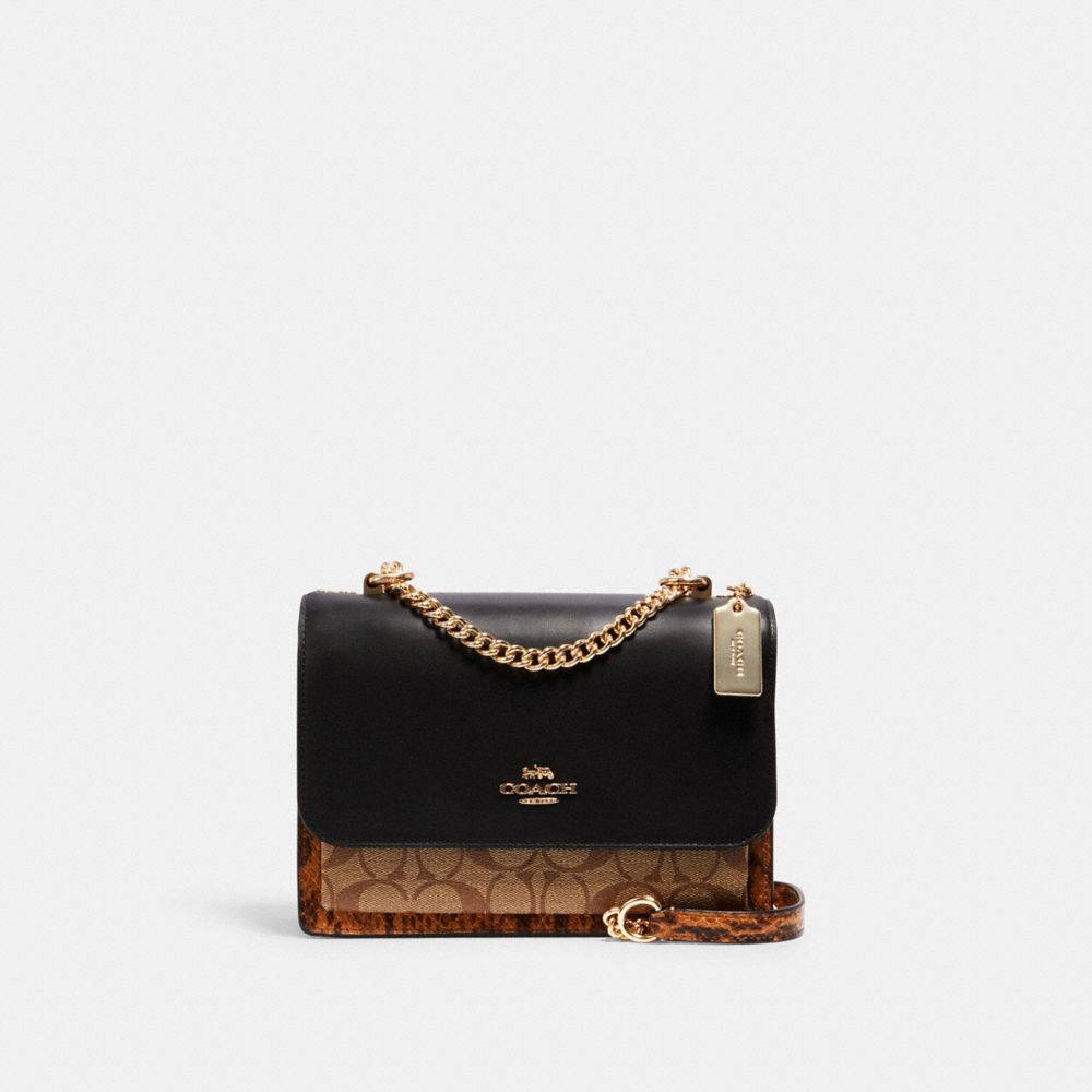 klare crossbody in blocked signature