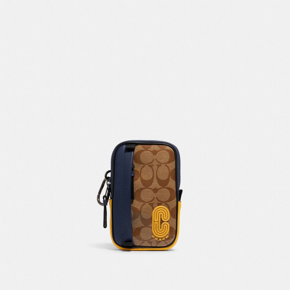 COACH NORTH/SOUTH HYBRID POUCH IN COLORBLOCK SIGNATURE CANVAS WITH COACH PATCH - QB/TAN MULTI - 1574