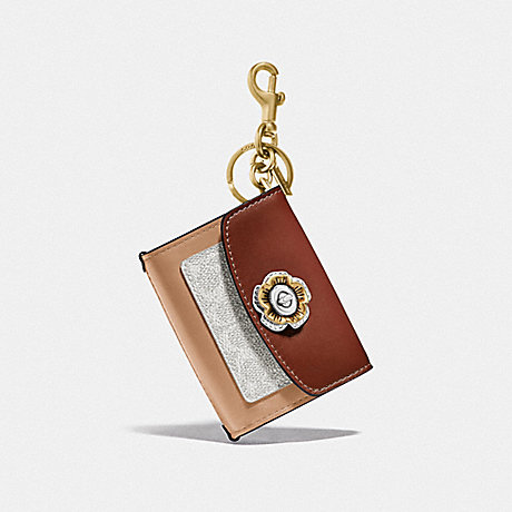 COACH MINI PARKER BAG CHARM IN COLORBLOCK SIGNATURE CANVAS WITH SNAKESKIN DETAIL - B4/SADDLE/CLAY/CHALK/TANGERINE - 1636