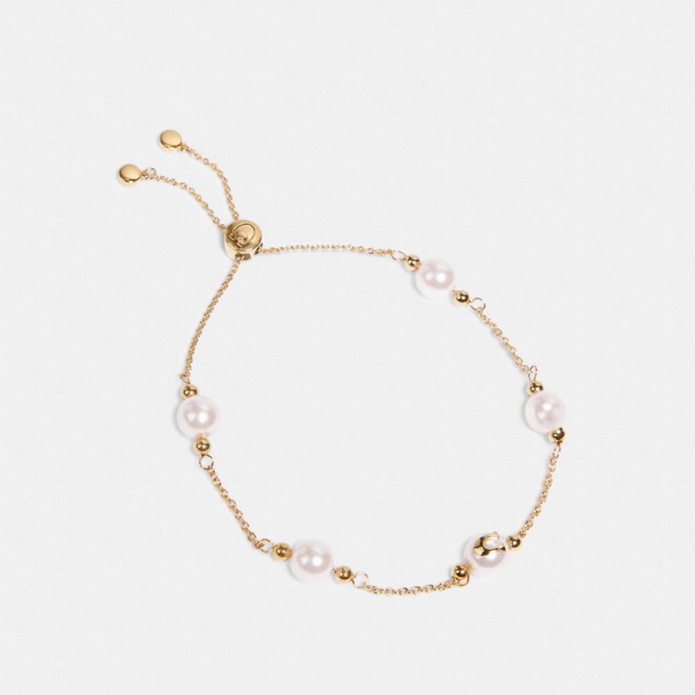 COACH 2009 - PEARL SIGNATURE SLIDER BRACELET GD/PINK