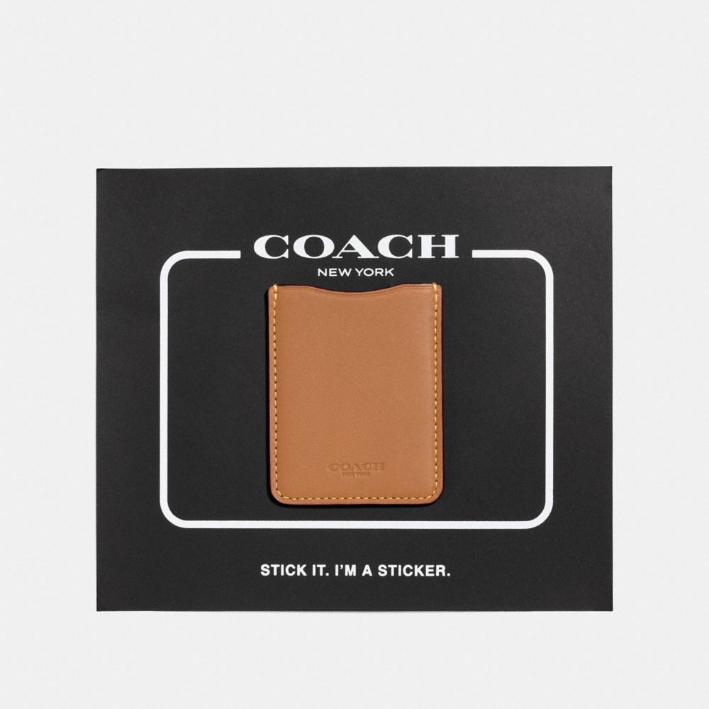 PHONE POCKET STICKER - SADDLE - COACH 23727