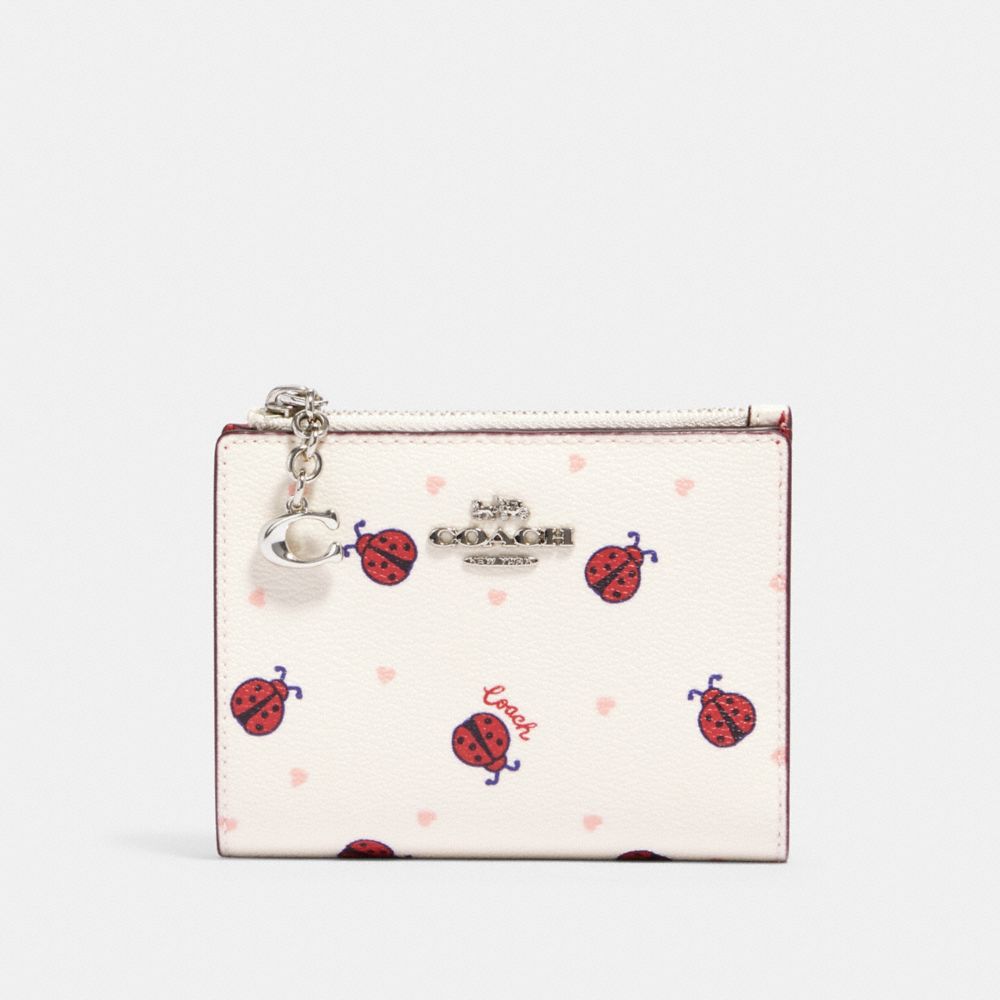 COACH SNAP CARD CASE WITH LADYBUG PRINT - SV/CHALK/ RED MULTI - 2427