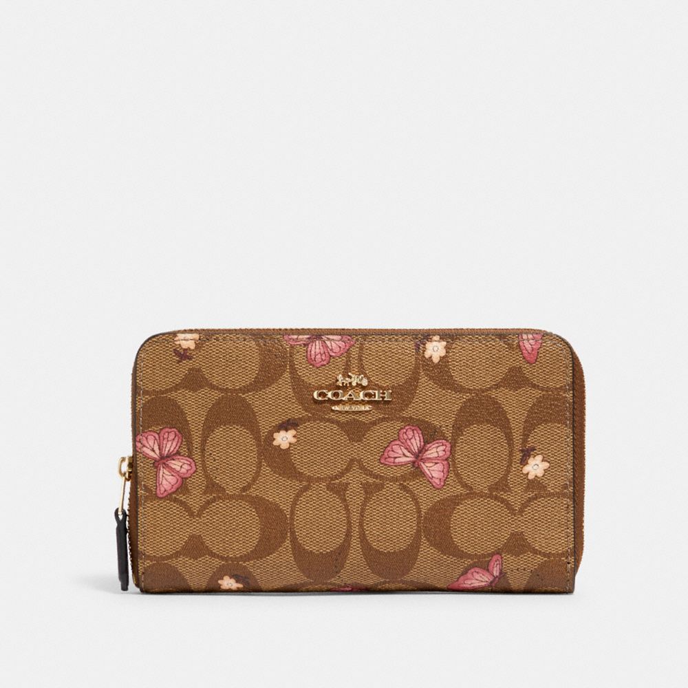 MEDIUM ZIP AROUND WALLET IN SIGNATURE CANVAS WITH BUTTERFLY PRINT - IM/KHAKI PINK MULTI - COACH 2883