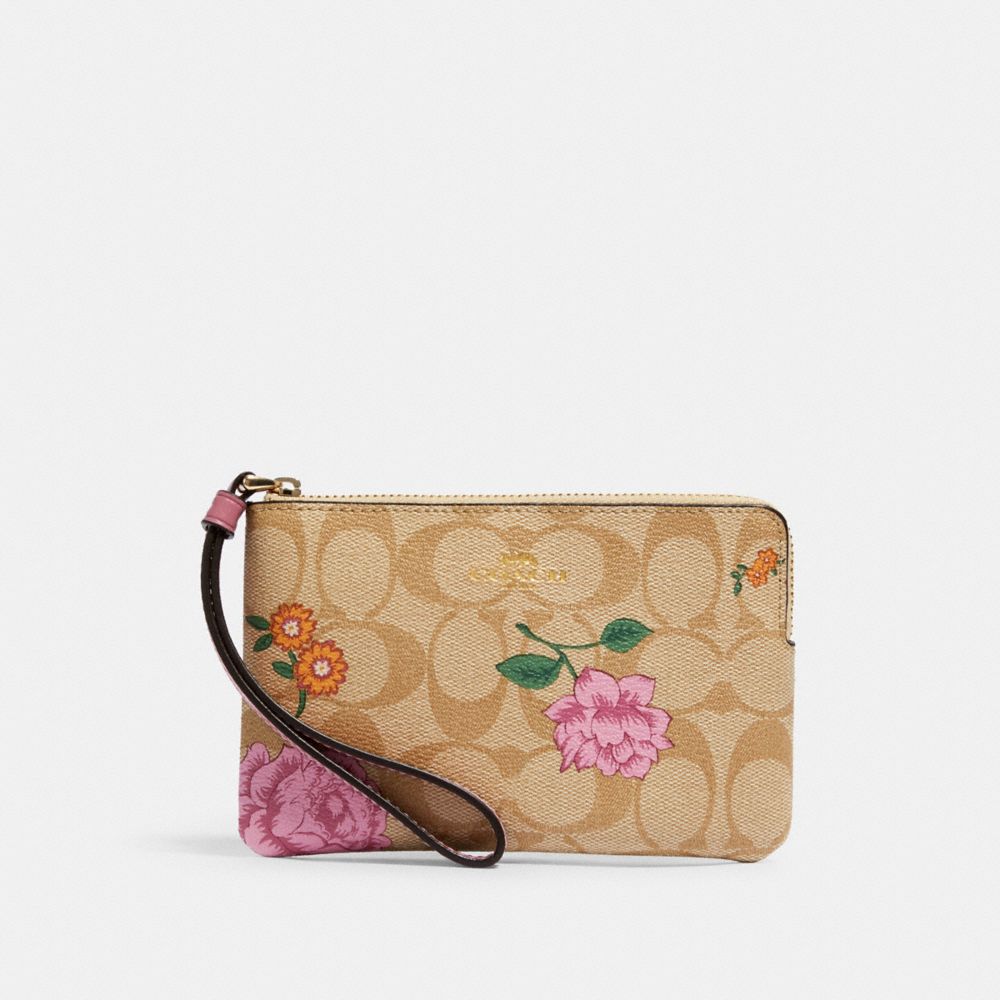 CORNER ZIP WRISTLET IN SIGNATURE CANVAS WITH PRAIRIE ROSE PRINT - IM/KHAKI MULTI - COACH 2973