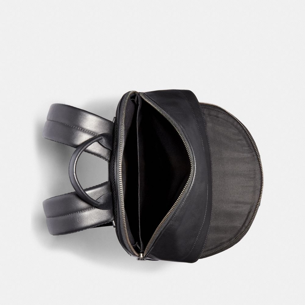 WEST BACKPACK IN SIGNATURE CANVAS WITH VARSITY STRIPE