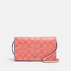 COACH ANNA FOLDOVER CROSSBODY CLUTCH IN SIGNATURE CANVAS - IM/CANDY PINK - 3036