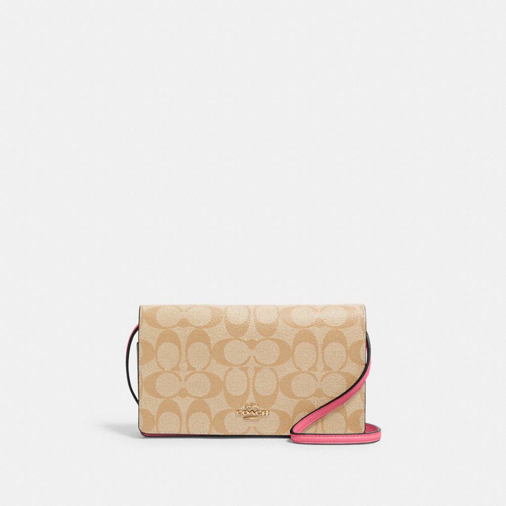 ANNA FOLDOVER CROSSBODY CLUTCH IN SIGNATURE CANVAS - 3036 - IM/LIGHT KHAKI/CONFETTI PINK