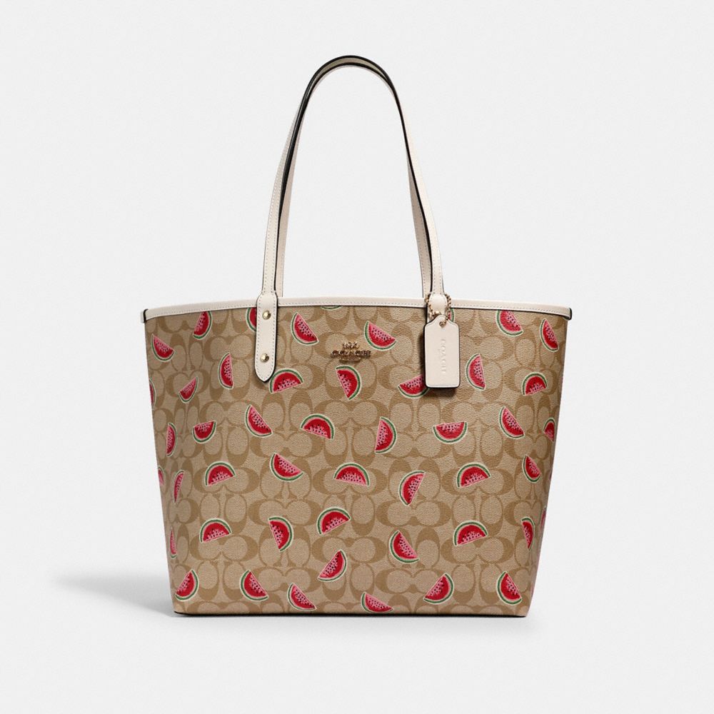 REVERSIBLE CITY TOTE IN SIGNATURE CANVAS WITH WATERMELON PRINT - 3039 - IM/LT KHAKI/RED MULTI/CHALK