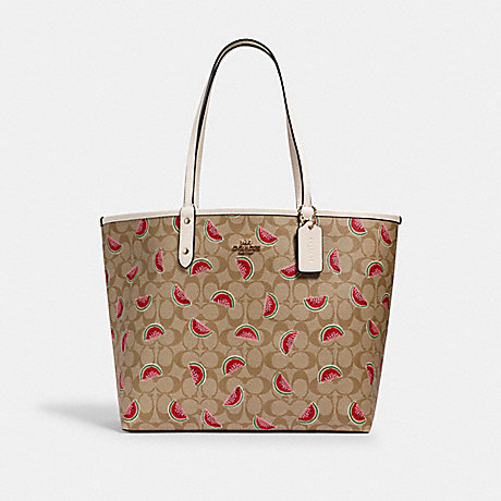 COACH REVERSIBLE CITY TOTE IN SIGNATURE CANVAS WITH WATERMELON PRINT - IM/LT KHAKI/RED MULTI/CHALK - 3039