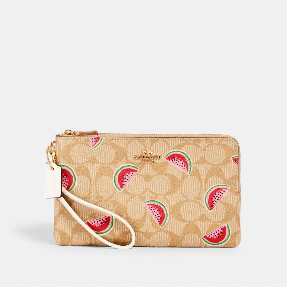 COACH DOUBLE ZIP WALLLET IN SIGNATURE CANVAS WITH WATERMELON PRINT - IM/LT KHAKI/RED MULTI - 3121