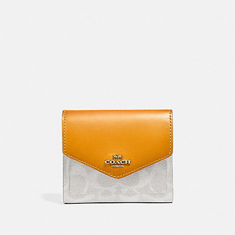 COACH Small Wallet In Colorblock Signature Canvas - BRASS/CHALK POLLEN - 31548