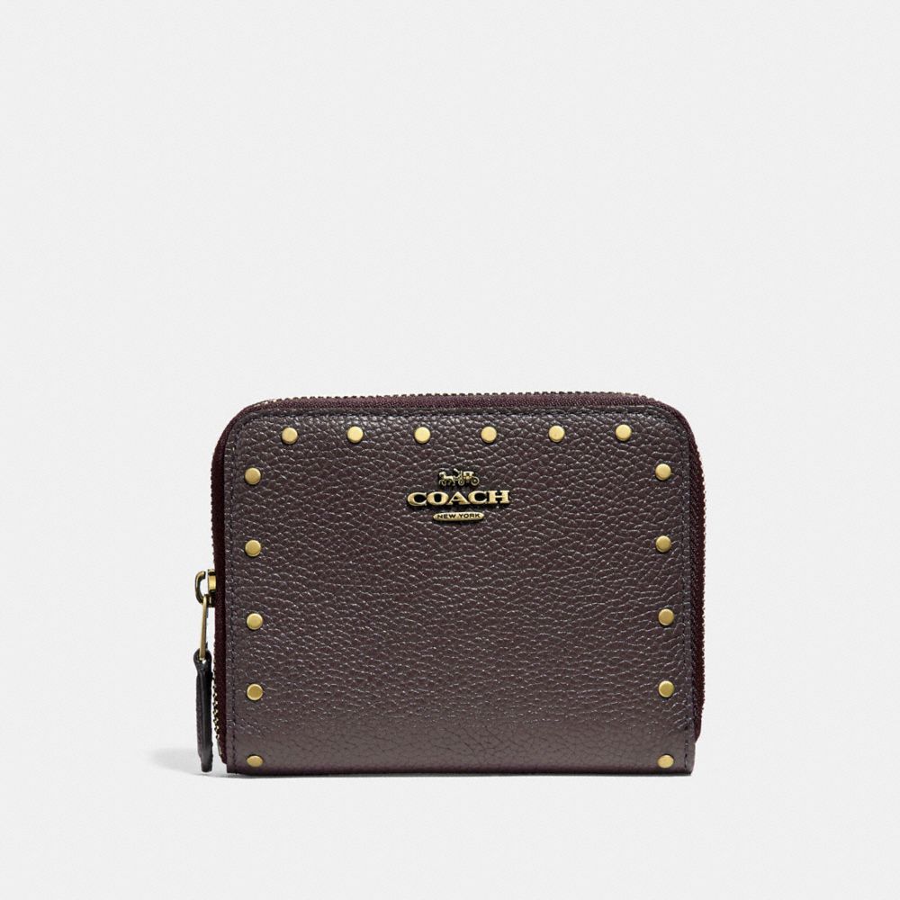 COACH SMALL ZIP AROUND WALLET WITH RIVETS - BRASS/OXBLOOD - 31811
