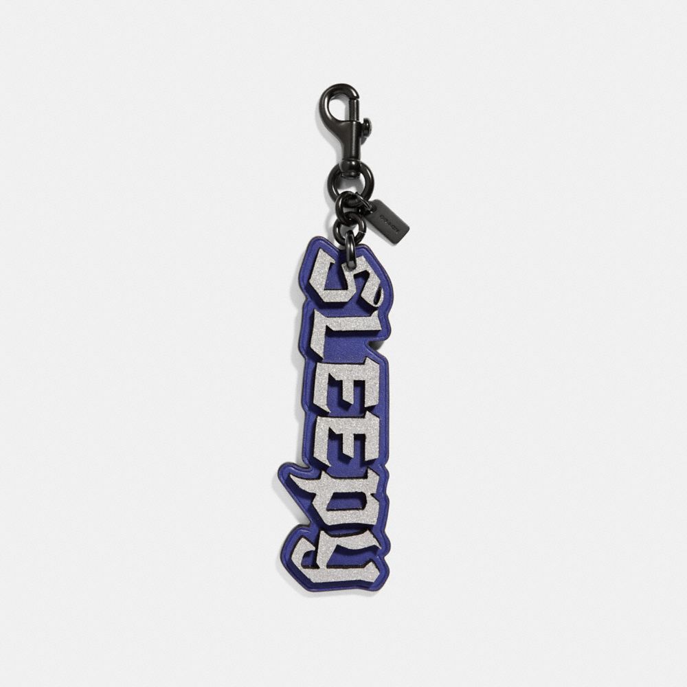 DISNEY X COACH SLEEPY BAG CHARM - 32540 - PURPLE/BLACK