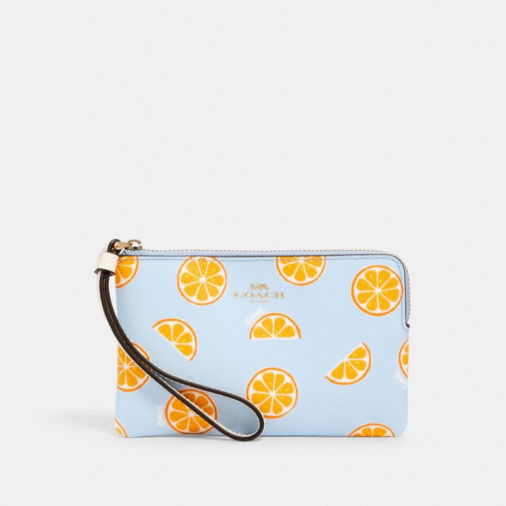 CORNER ZIP WRISTLET WITH ORANGE PRINT - IM/ORANGE/BLUE - COACH 3284