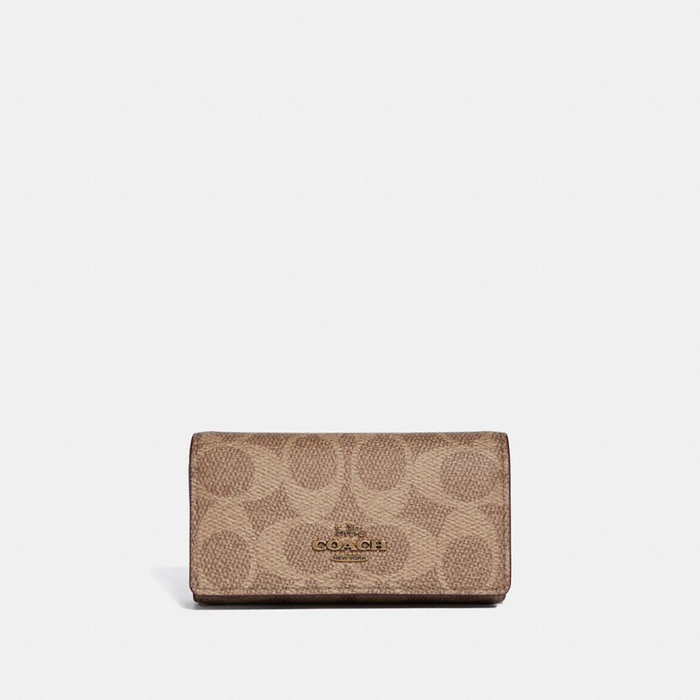 COACH 33069 Six Ring Key Case In Signature Canvas TAN/RUST/BRASS