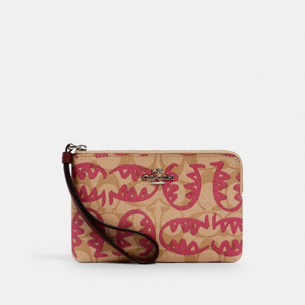 COACH 4406 - CORNER ZIP WRISTLET IN SIGNATURE CANVAS WITH REXY BY GUANG YU SV/LT KHAKI/ELCTRC PINK MULTI
