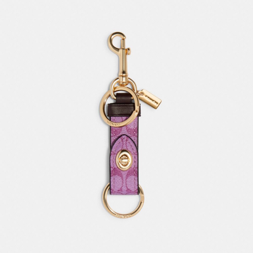 【COACH】Trigger Snap Bag Charm In Signature Canvas COACH® Outlet | Trigger Snap Bag Charm In Signature Canvas