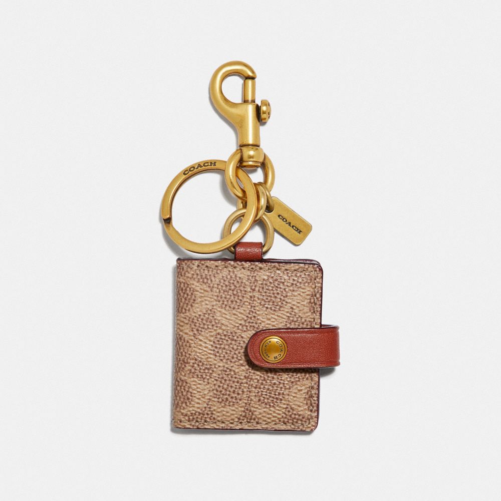 COACH 55785 Picture Frame Bag Charm In Signature Canvas Brass/Khaki