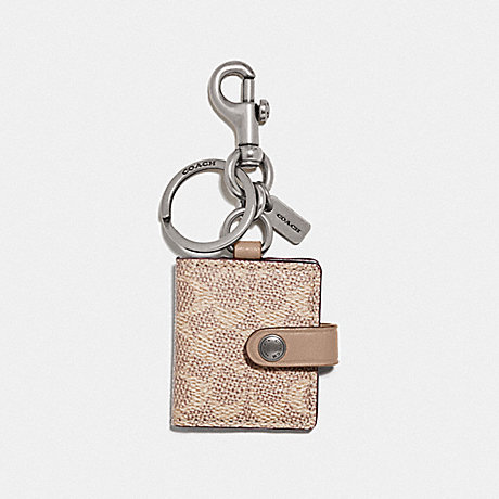 COACH 55785 PICTURE FRAME BAG CHARM IN SIGNATURE CANVAS NICKEL/SAND/TAUPE