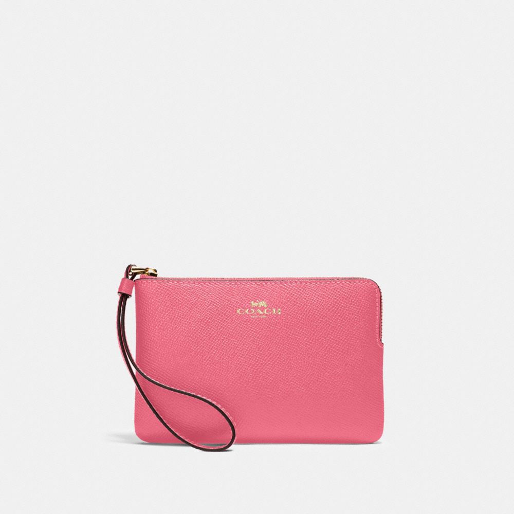 COACH CORNER ZIP WRISTLET - IM/CONFETTI PINK - 58032