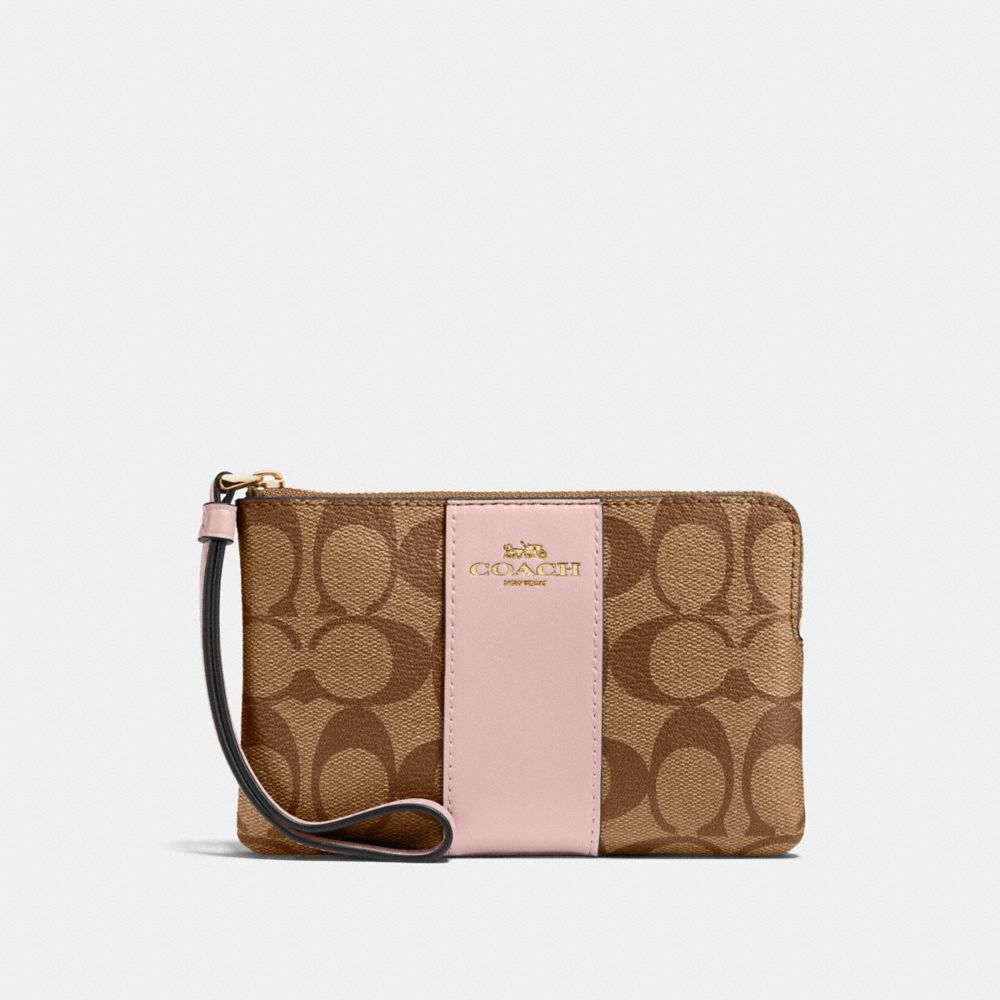 COACH CORNER ZIP WRISTLET IN SIGNATURE CANVAS - IM/KHAKI BLOSSOM - 58035