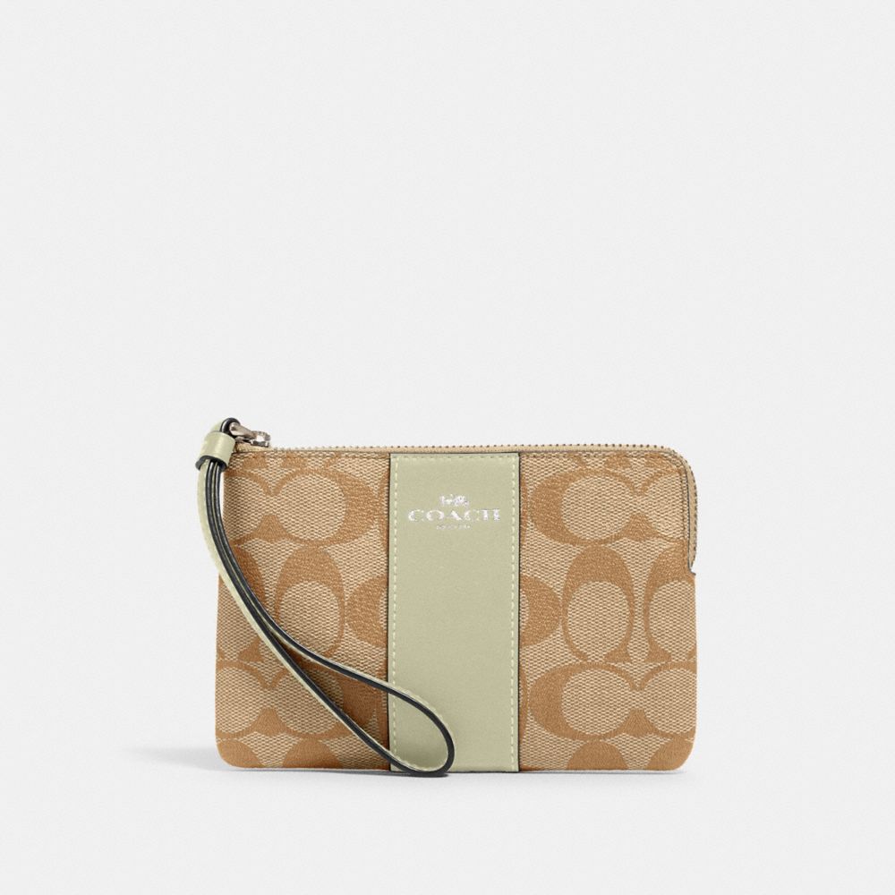 COACH 58035 - CORNER ZIP WRISTLET IN SIGNATURE CANVAS SV/LIGHT KHAKI/PALE GREEN