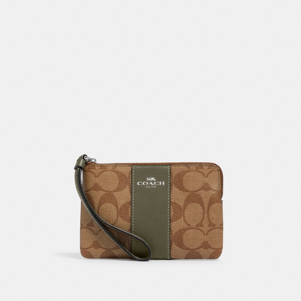 COACH CORNER ZIP WRISTLET IN SIGNATURE CANVAS - SV/KHAKI/SURPLUS - 58035