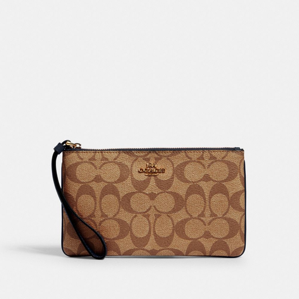 COACH LARGE WRISTLET IN SIGNATURE CANVAS - IM/KHAKI MIDNIGHT - 58695