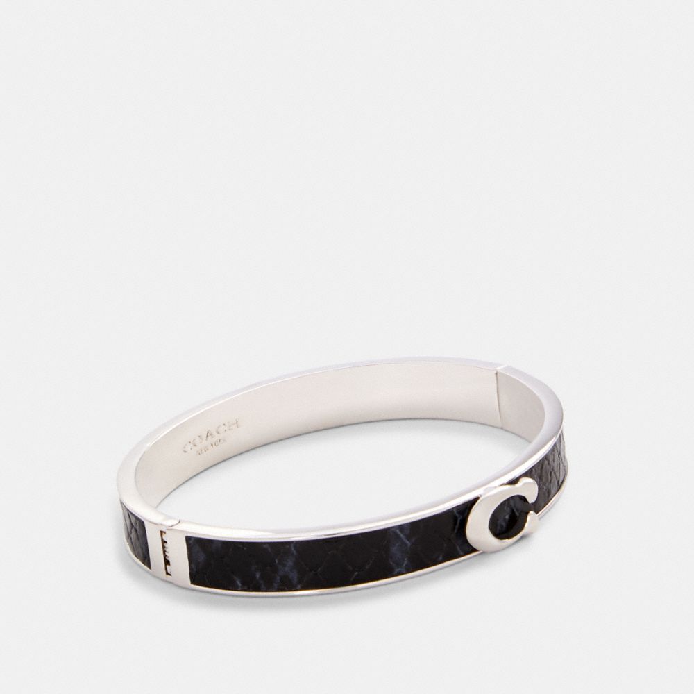 COACH 6107 - SIGNATURE HINGED BANGLE SV/MIDNIGHT