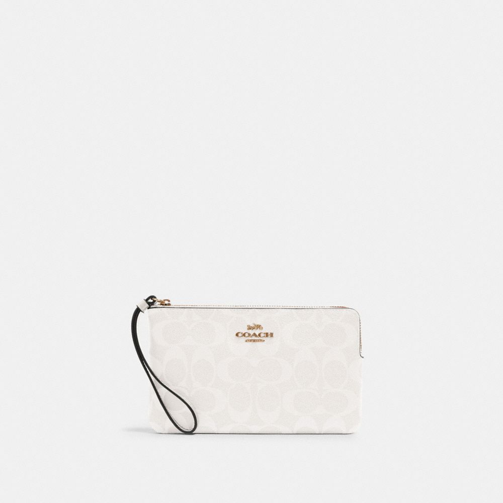 COACH LARGE CORNER ZIP WRISTLET IN SIGNATURE CANVAS - IM/CHALK/GLACIERWHITE - 6648