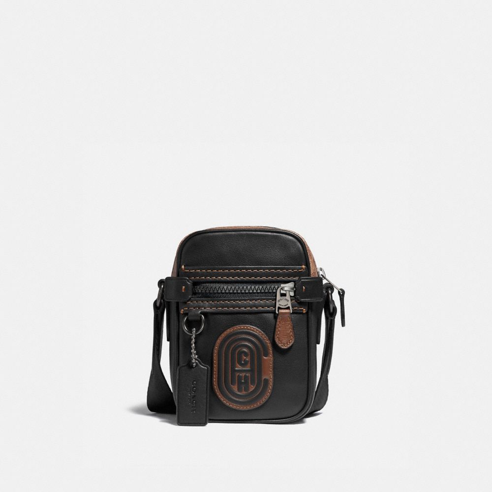 COACH 76167 DYLAN 10 WITH SIGNATURE CANVAS BLOCKING AND COACH PATCH BLACK/KHAKI/BLACK-COPPER