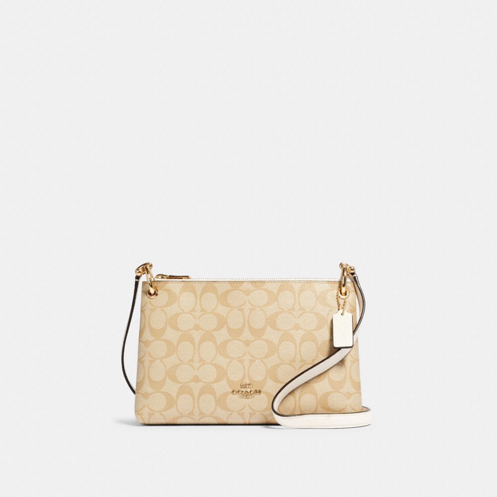 COACH®: Heart Crossbody In Signature Canvas