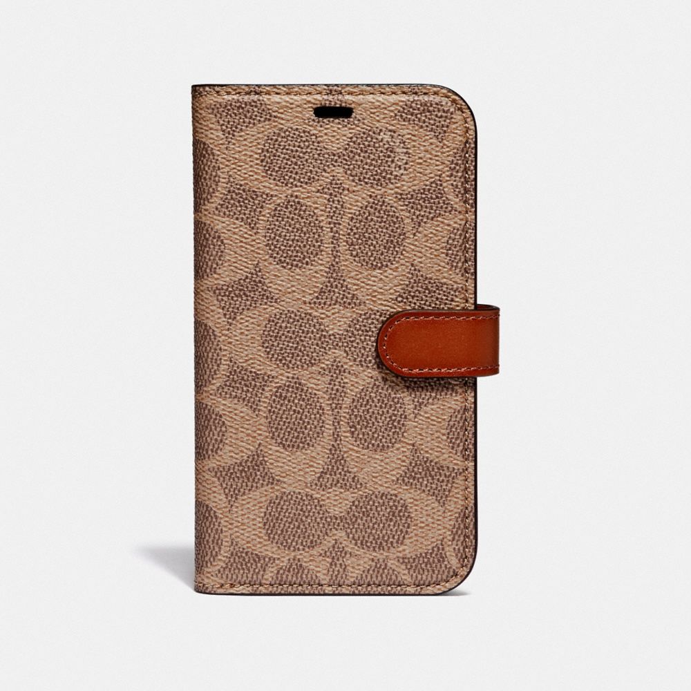 COACH IPHONE X/XS FOLIO IN SIGNATURE CANVAS - TAN - 78767