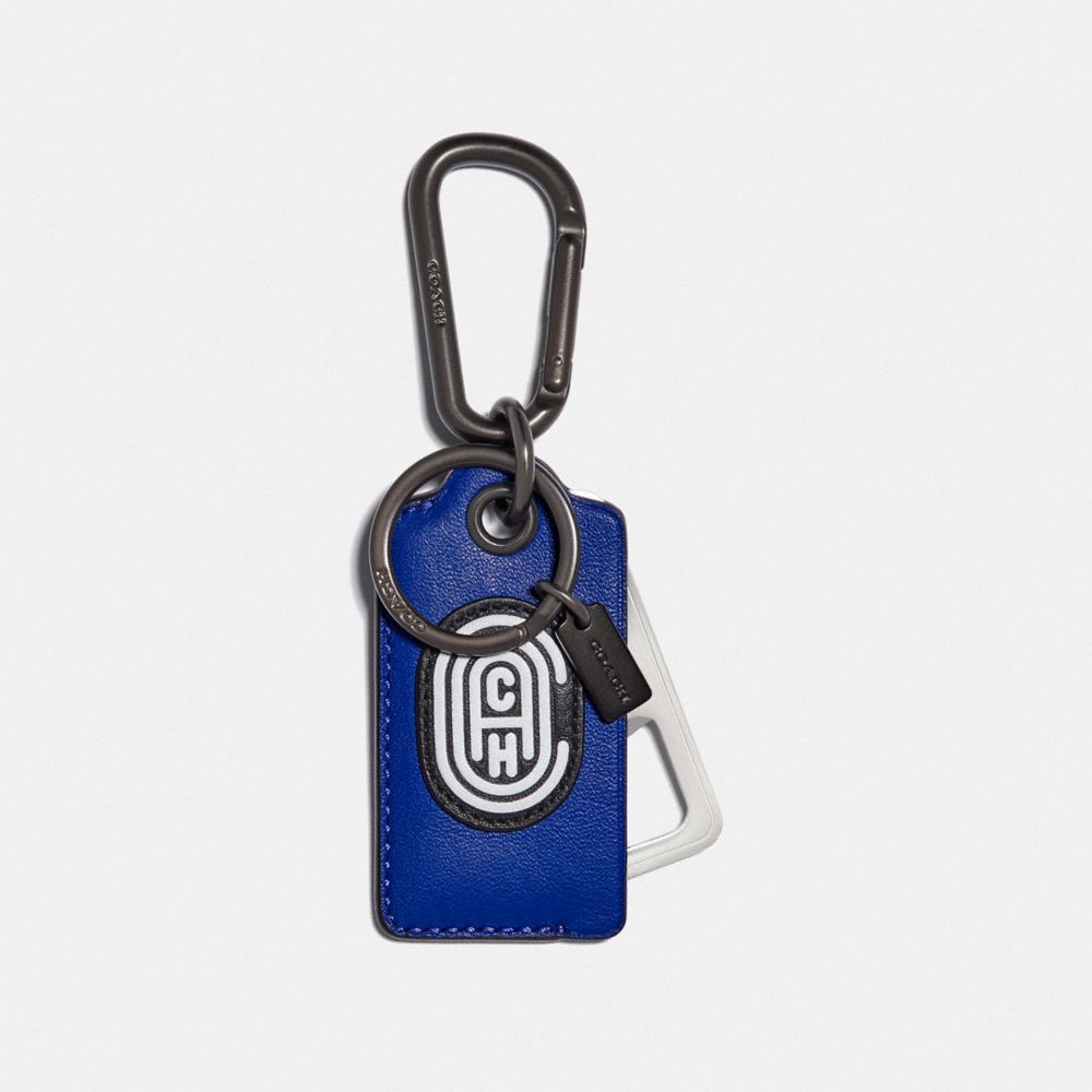 COACH 79729 BOTTLE OPENER KEY FOB WITH REFLECTIVE COACH PATCH SPORT BLUE/SILVER