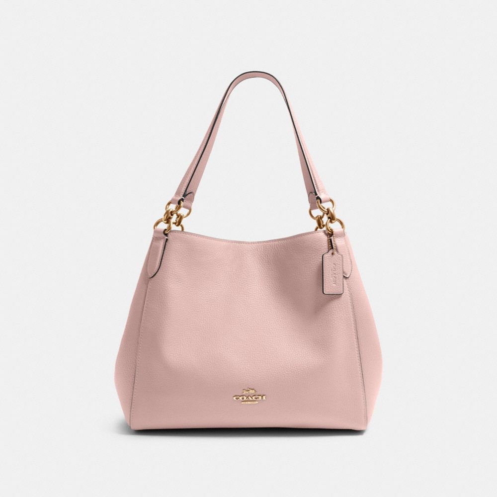 beige coach purse