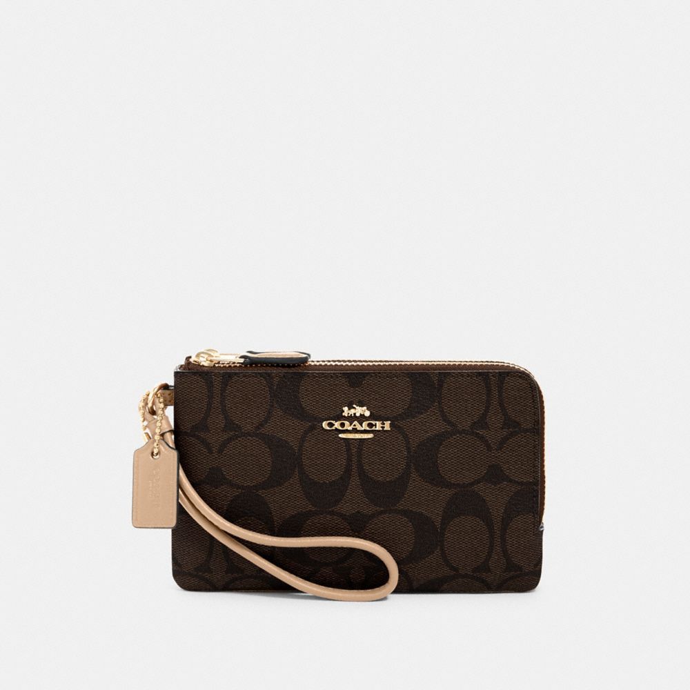 DOUBLE CORNER ZIP WRISTLET IN SIGNATURE CANVAS - IM/BROWN/METALLIC PALE GOLD - COACH 87591