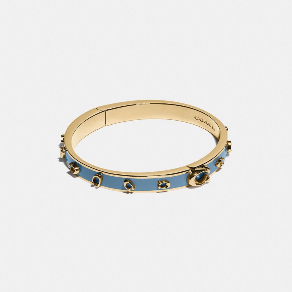 COACH 88144 - PEGGED SIGNATURE BANGLE - GOLD/LAKE | COACH WOMEN