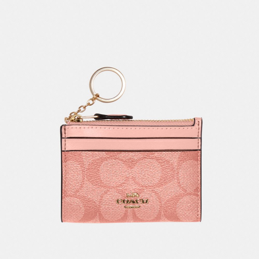 COACH MINI SKINNY ID CASE IN SIGNATURE CANVAS - IM/CANDY PINK - 88208