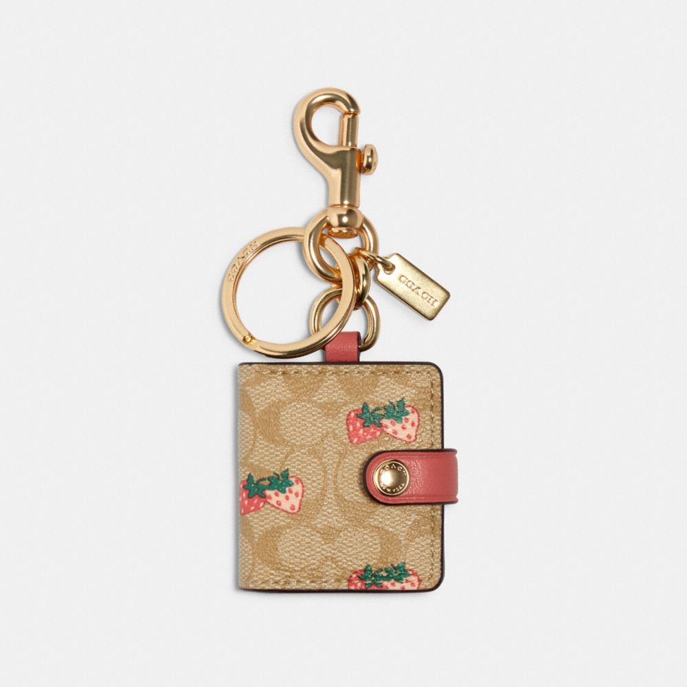 COACH 89998 Picture Frame Bag Charm In Signature Canvas With Strawberry Print IM/LIGHT KHAKI/CORAL
