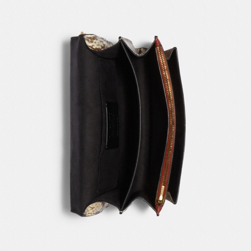 KLARE CROSSBODY IN SIGNATURE CANVAS WITH RIVETS