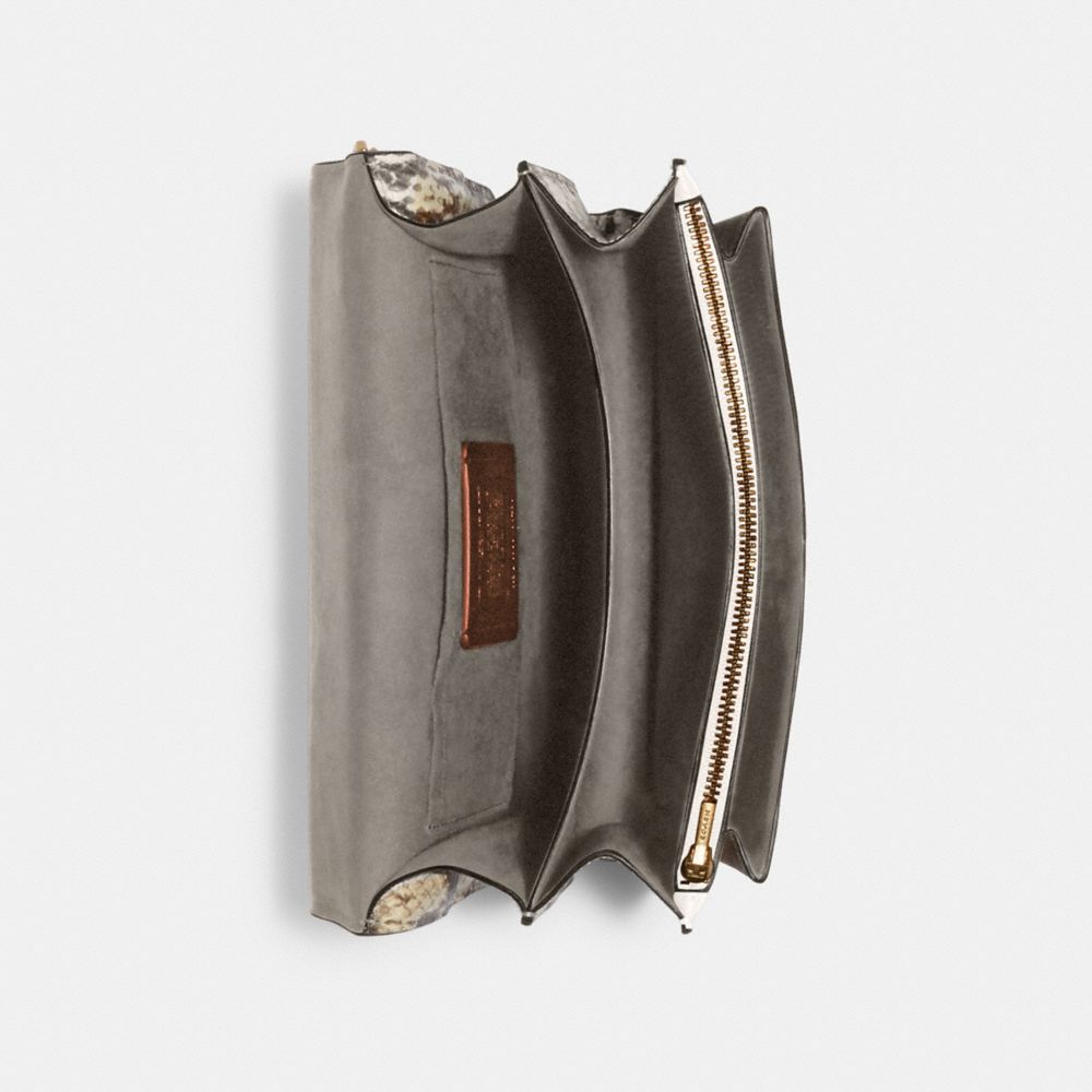 KLARE CROSSBODY IN SIGNATURE CANVAS WITH RIVETS