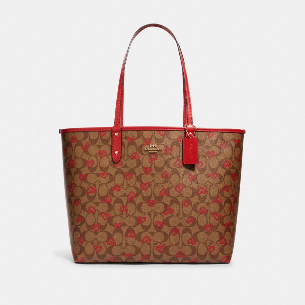 COACH REVERSIBLE CITY TOTE IN SIGNATURE CANVAS WITH CRAYON HEARTS PRINT - IM/KHAKI MULTI TRUE RED - 91014