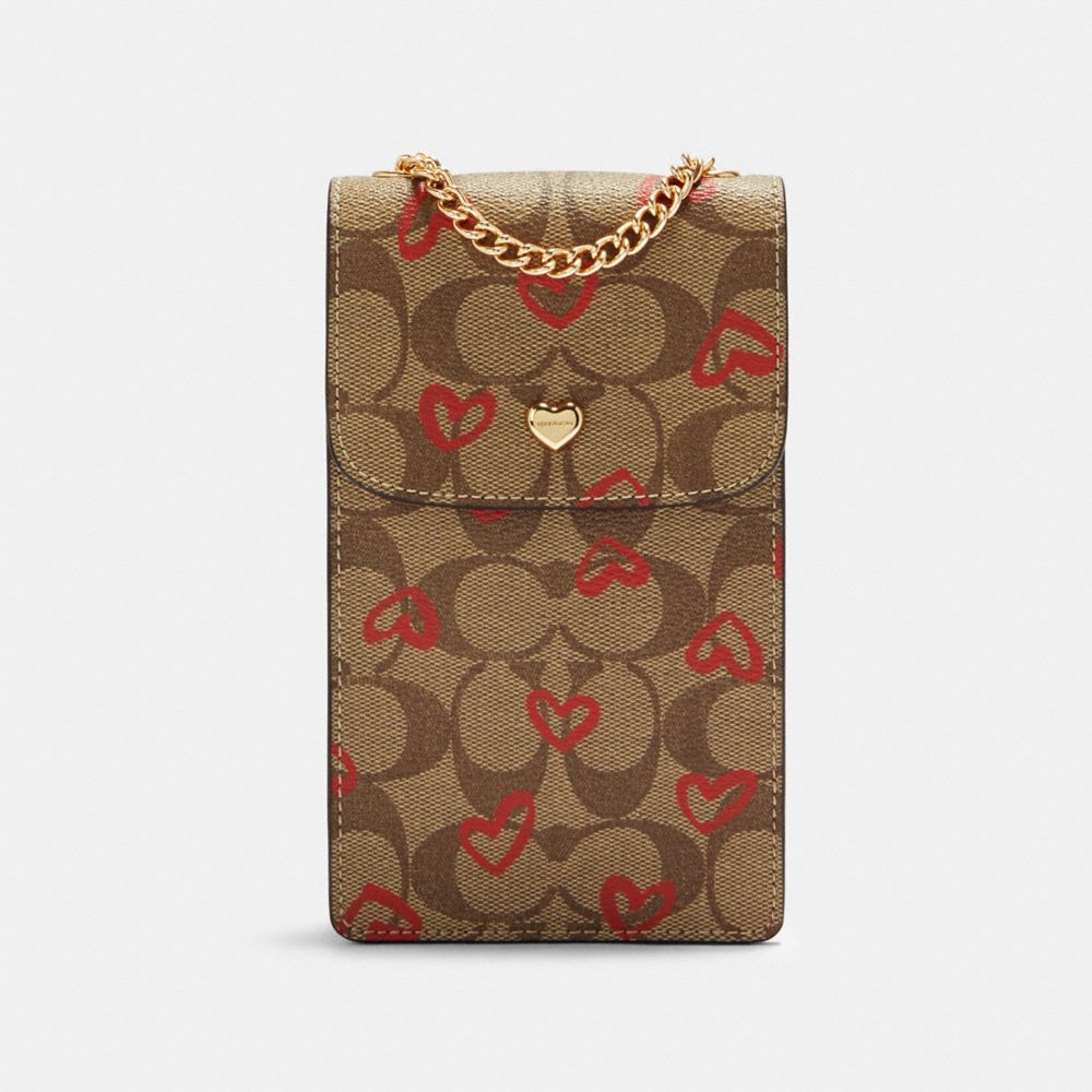NORTH/SOUTH CROSSBODY IN SIGNATURE CANVAS WITH CRAYON HEARTS PRINT - 91046 - IM/KHAKI RED MULTI