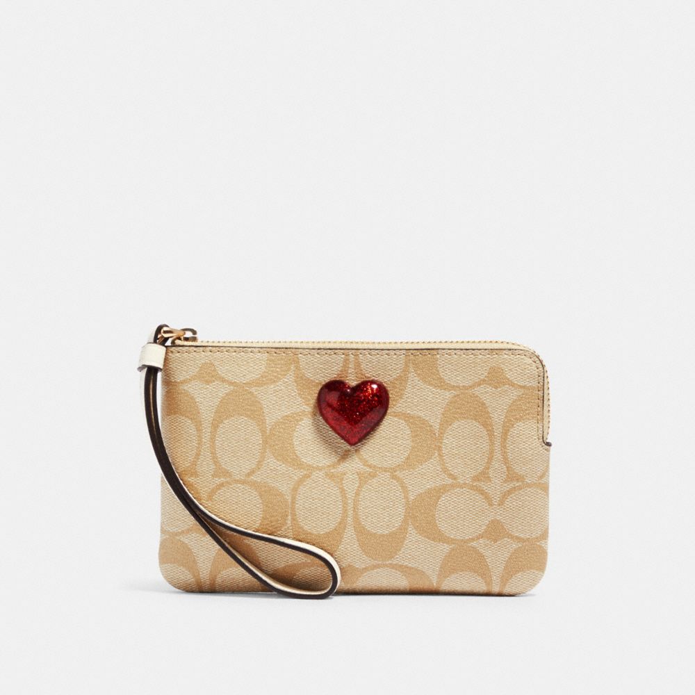 CORNER ZIP WRISTLET IN SIGNATURE CANVAS WITH HEART - IM/LIGHT KHAKI MULTI - COACH 91072