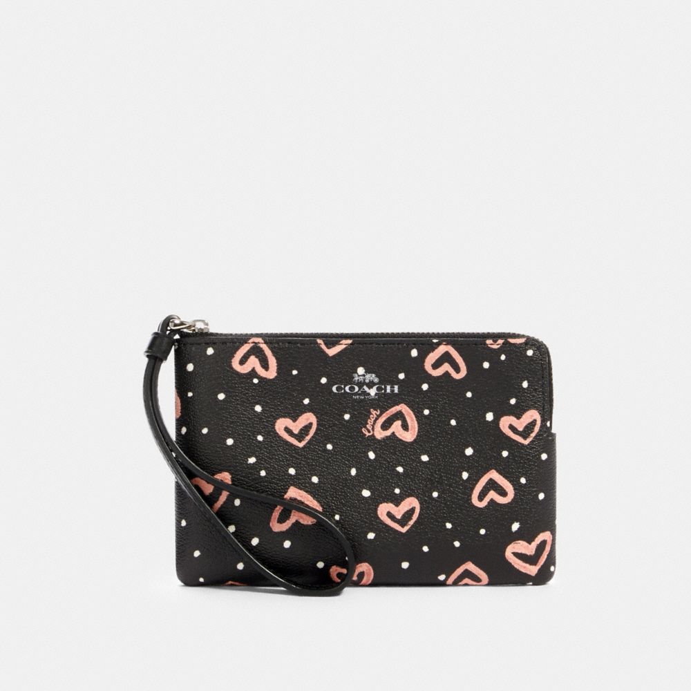 CORNER ZIP WRISTLET WITH CRAYON HEARTS PRINT - SV/BLACK PINK MULTI - COACH 91078