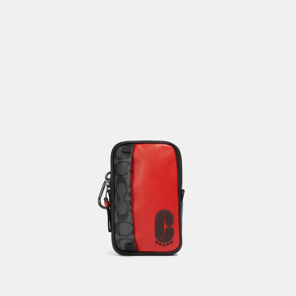 COACH 91301 NORTH/SOUTH HYBRID POUCH IN SIGNATURE CANVAS WITH COACH PATCH QB/SPORT RED CHARCOAL