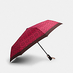 UMBRELLA IN FUN SIGNATURE PRINT - MAGENTA - COACH 91361