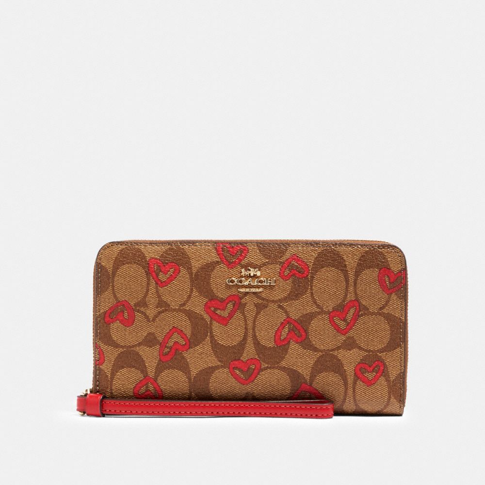 COACH 91578 Large Phone Wallet In Signature Canvas With Crayon Hearts Print IM/KHAKI RED MULTI