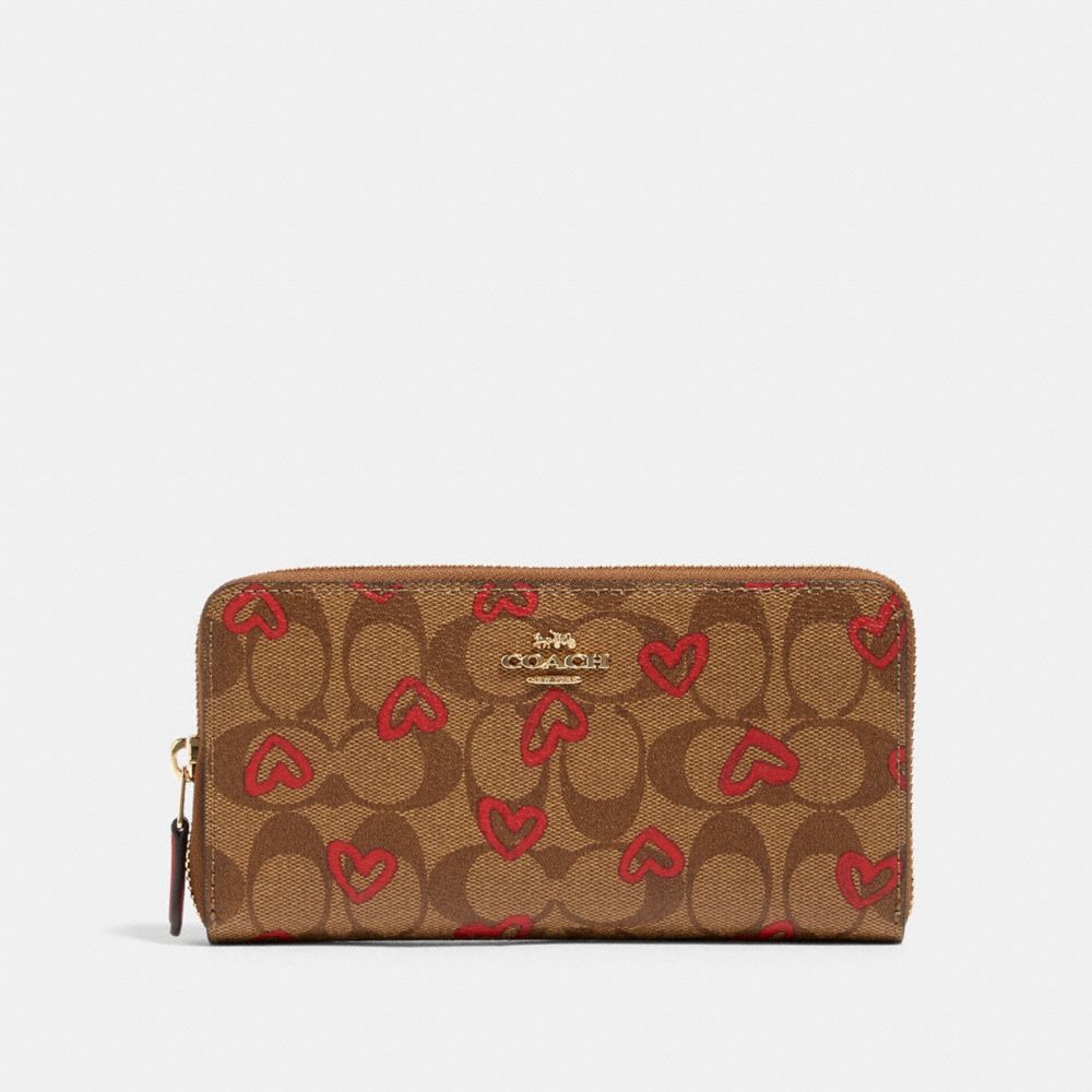 COACH 91649 ACCORDION ZIP WALLET IN SIGNATURE CANVAS WITH CRAYON HEARTS PRINT IM/KHAKI RED MULTI